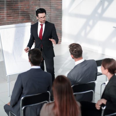 Businessman,And,Business,Team,Discussing,The,Presentation,Of,The,New